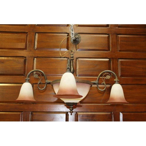 16 - Polished metal four branch chandelier with tulip shades {80 cm H x 90 cm Dia.}.