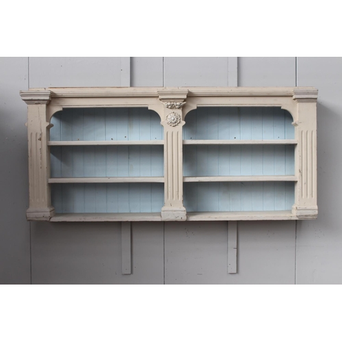 42 - Painted pine hanging display unit with three shelves {82 cm H x 200 cm W x 32 cm D}.