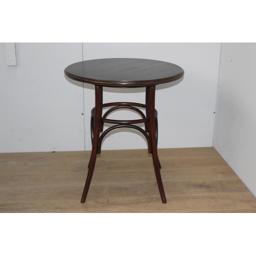 45 - Bentwood side table {75 cm H x 70 cm Dia.}.