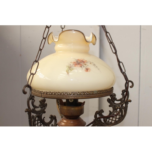 51 - Brass and wood hanging oil lamp {90 cm H x 30 cm Dia.}.