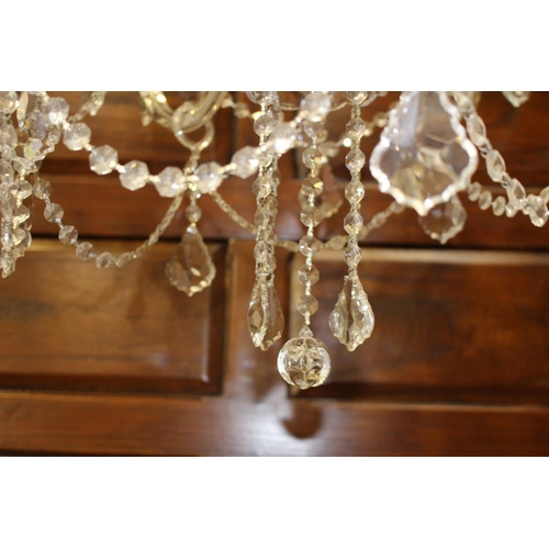 9 - Nine branch crystal chandelier {110 cm H x 70 cm Dia.}.