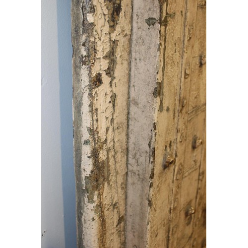 21 - Pair of 18th C. pitch pine doors with heavy rivets {207 cm H x 113 cm W x 10 cm D}.