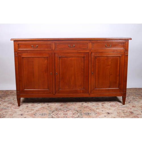 20 - A GRANGE CHERRYWOOD SIDEBOARD of rectangular outline with three frieze drawers and cupboards on squa... 