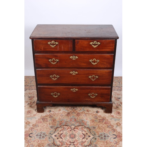 21 - A GEORGIAN MAHOGANY CHEST of rectangular outline the shaped top with two short and three long gradua... 