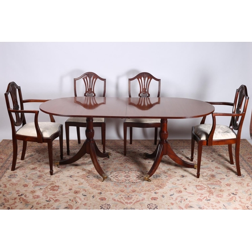 28 - A SEVEN PIECE HEPPLEWHITE DESIGN MAHOGANY DINING SUITE comprising six chairs including a pair of elb... 