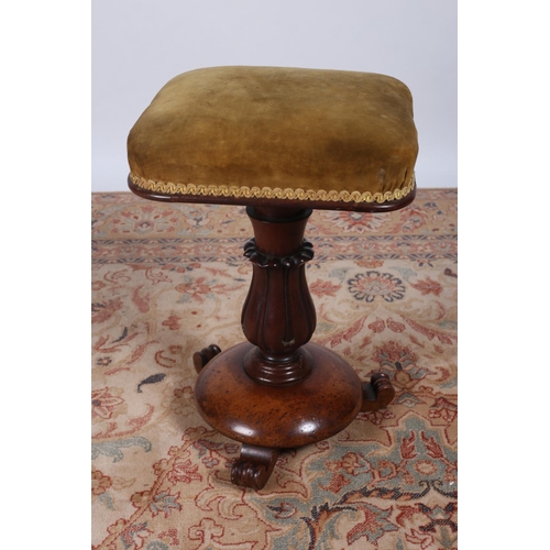 42 - A VICTORIAN MAHOGANY REVOLVING STOOL the square upholstered seat above a leaf capped baluster column... 