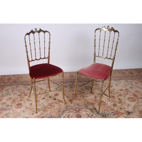 43 - A PAIR OF BRASS FRAMED CHAIRS each with baluster shaped splats and upholstered seats on slayed legs