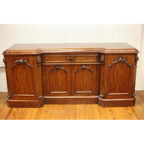 58 - A GOOD VICTORIAN MAHOGANY MIRRORED BACK SIDEBOARD (possibly by Strahan's of Dublin) of inverted brea... 