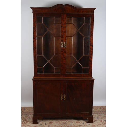 1 - A GEORGIAN STYLE MAHOGANY DISPLAY CABINET the arched cornice above a pair of astragal glazed doors w... 