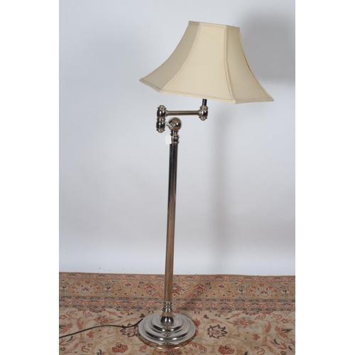 42 - A CONTEMPORARY WHITE METAL FLOOR STANDING LAMP with adjustable arm and shade 47cm (h)