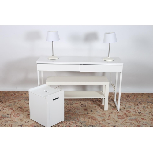 49 - A MODERN WHITE MELAMINE AND METAL TWO DRAWER SIDE TABLE together with a pair of table lamps two tier... 