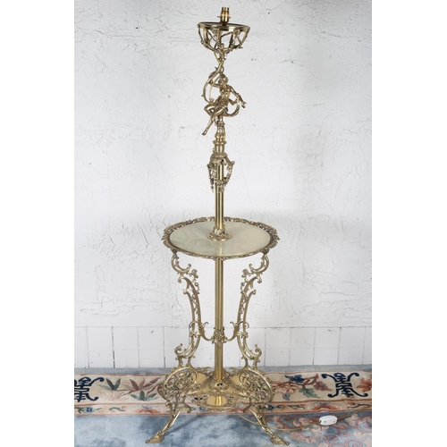 52 - A 19TH CENTURY BRASS AND ONYX STANDARD LAMP the cylindrical column surmounted by a female figure sho... 