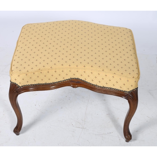 53 - A CONTINENTAL WALNUT AND UPHOLSTERED STOOL the serpentine seat above a moulded apron on cabriole leg... 