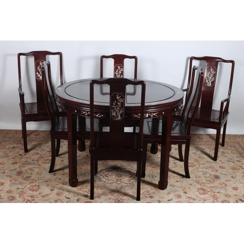 55 - A SEVEN PIECE ORIENTAL ROSEWOOD AND MOTHER OF PEARL INLAID DINING ROOM SUITE comprising six chairs i... 