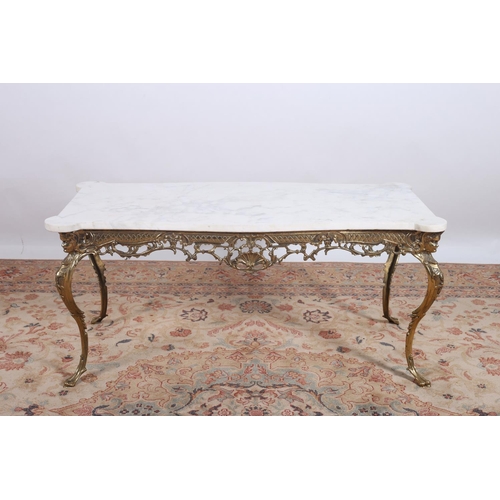 57 - A CONTINENTAL GILT BRASS AND MARBLE COFFEE TABLE of serpentine outline the shaped top with eared cor... 
