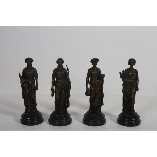 59 - AFTER CESARO A SET OF FOUR CAST BRONZE FIGURES each modelled as a classical female with loose draper... 
