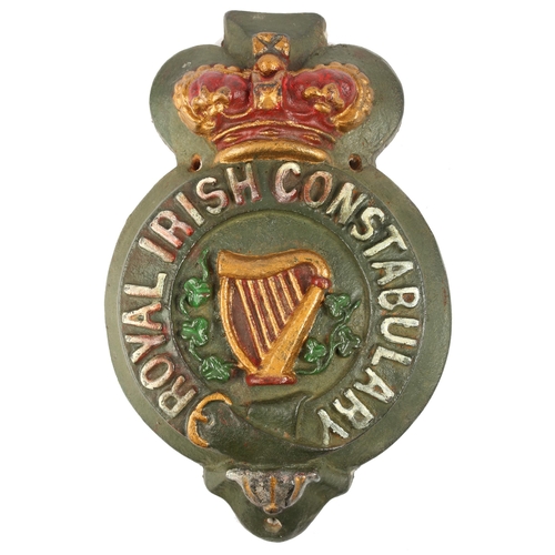 46 - Victorian Royal Irish Constabulary barracks sign. A painted, cast iron relief sign, the badge of the... 
