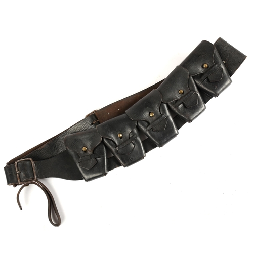 48 - Royal Irish Constabulary bandolier. A black leather five-pouch bandolier dated 1918 and maker's mark... 
