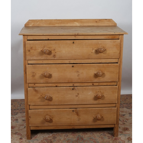 25 - A VINTAGE PINE CHEST of rectangular outline the shaped top above four long graduated drawers on moul... 
