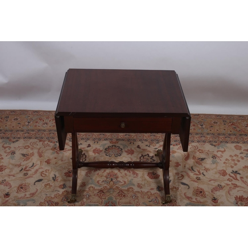 26 - A MAHOGANY DROP LEAF TABLE the rectangular hinged top with frieze drawer on lyre end standard suppor... 