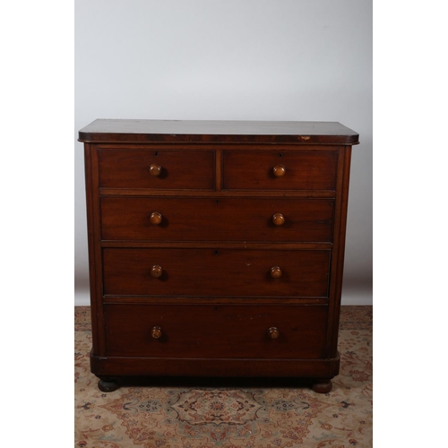 32 - A 19TH CENTURY MAHOGANY CHEST of two short and three long graduated drawers on bun feet 125cm (h) x ... 