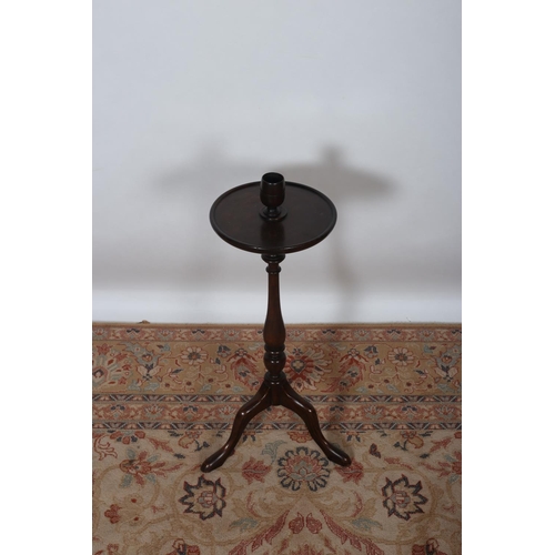 39 - A MAHOGANY STAND the circular dish top with container above a baluster column on tripod support 70cm... 