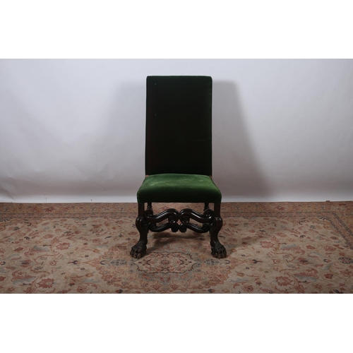 15 - A GEORGIAN OAK AND UPHOLSTERED SIDE CHAIR the rectangular upholstered back and seat above a C-scroll... 