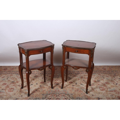 22 - A PAIR OF FRENCH KINGWOOD AND GILT BRASS MOUNTED TABLES each of serpentine outline with frieze drawe... 