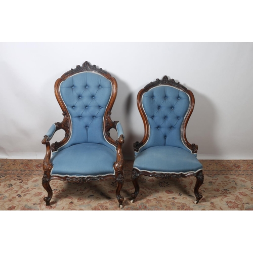 3 - A PAIR OF 19TH CENTURY MAHOGANY LADY AND GENTLEMAN'S CHAIR each with a carved top rail above a butto... 