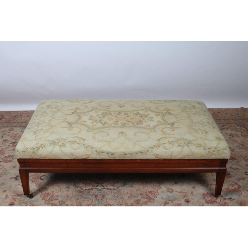 6 - A CONTINENTAL CHERRYWOOD NEEDLEWORK UPHOLSTERED STOOL the rectangular seat above a moulded apron on ... 