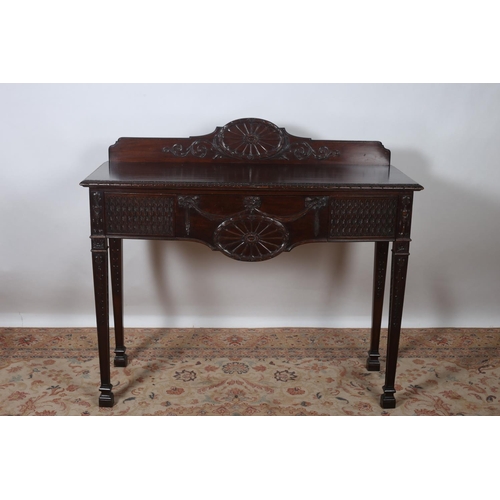 7 - A HEPPLEWHITE DESIGN MAHOGANY SIDE TABLE of rectangular bowed outline the carved back above three fr... 
