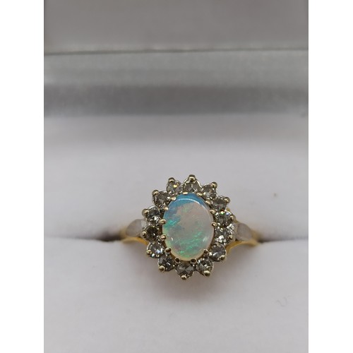 10 - Hallmarked 18ct Gold Opal and Diamond Ring Size L/M 3.70 grams