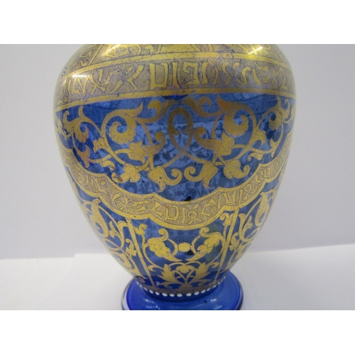 89 - VENETIAN GLASS, a fine gilded twin handled blue glass vase, decorated in Persian style, 8.5