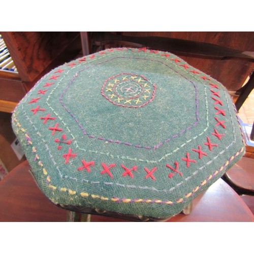 609 - FOLK ART - VINTAGE PAINTED STOOL, with naive needlework top with floral pattern motifs to the painte... 