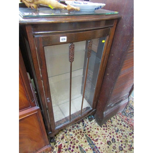 629 - MAHOGANY DISPLAY CABINET, glazed door enclosing 2 glass shelves, on cabriole legs and ball and claw ... 