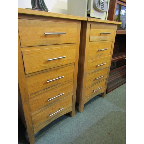 606 - PAIR OF LIGHT OAK 5 DRAWER CHESTS, 22