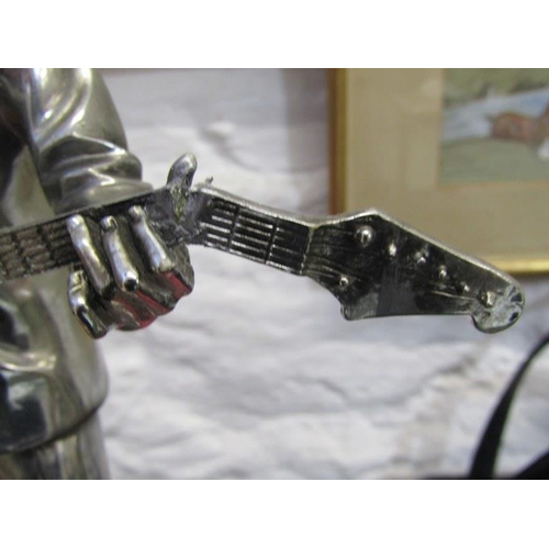 67 - MUSIC, silvered Buddy Holly figure by Leonardo (some damage), 13.5
