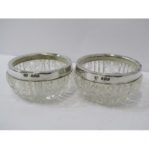 524 - CUT GLASS, A pair of antique silver rimmed cut glass circular salts
