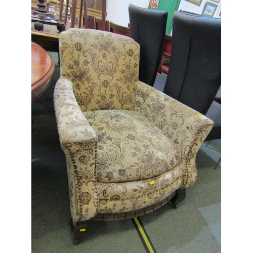 742 - VINTAGE ARM CHAIR, With foliate upholstery and castor feet