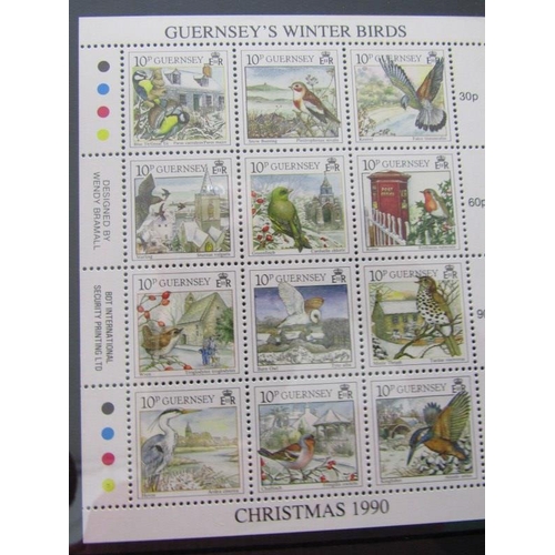 83 - Guernsey collection FDCs, mostly 1980s/1990s in album plus 4 folders of presentation packs, all in b... 
