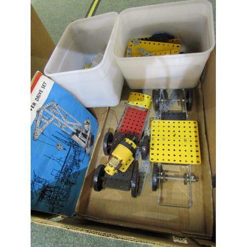150 - MECCANO, 2 Plastic tubs containing a selection of assorted Meccano, Meccano booklets etc