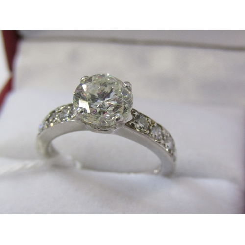 314 - PLATINUM SET DIAMOND SOLITIAIRE RING, principal transitional brilliant cut diamond of good colour wi... 