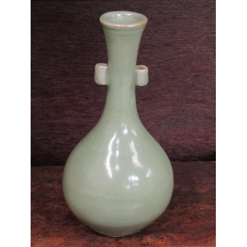 63 - ORIENTAL CERAMICS, Chinese Yuan Dynasty small celadon glazed bottle vase, ovoid body, elegantly risi... 