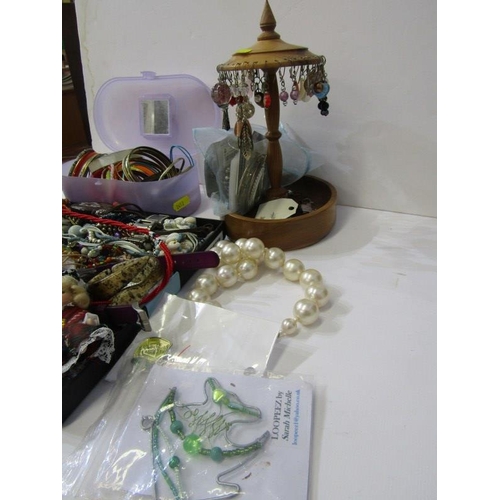 93 - COSTUME JEWELLERY, shelf of costume jewellery including watches, beads, bracelets, shells, bangles, ... 