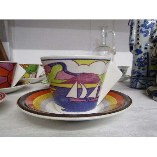 7 - CLARICE CLIFF, 8 Bradford Exchange limited edition Clarice Cliff design cups and saucers