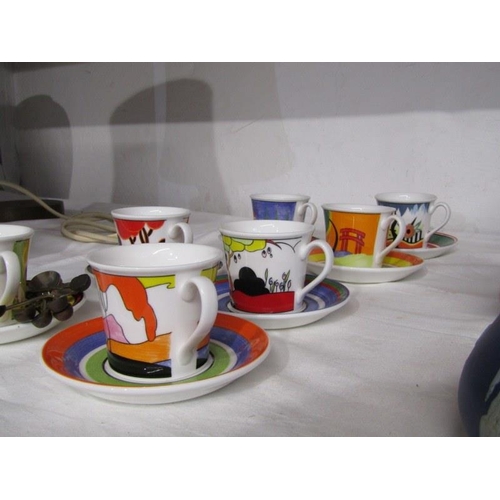 9 - CLARICE CLIFF, Wedgwood 14 piece coffee ware together with 6 spoons
