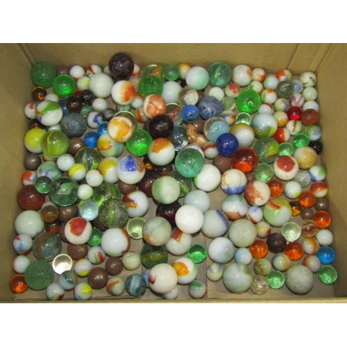 73 - MARBLES, a collection of vintage of marbles  various size