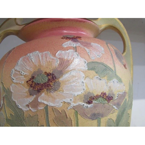 12 - ART NOUVEAU DESIGN, pair of poppy decorated twin handled Continental pottery vases, 32cm height