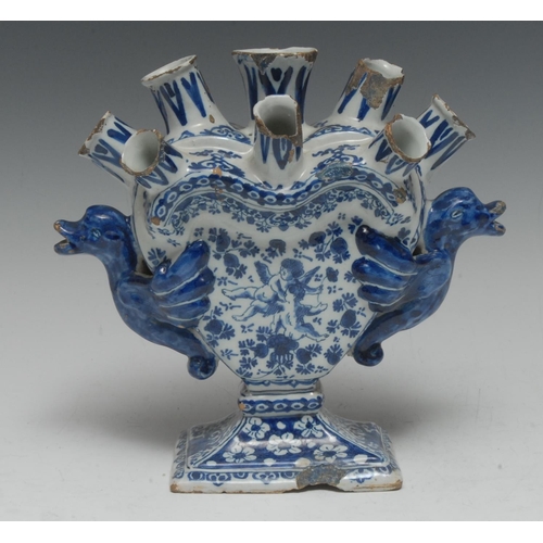 10 - A Dutch Delft blue and white tulip vase, possibly De Metale Pot Factory, the heart-shaped body surmo... 