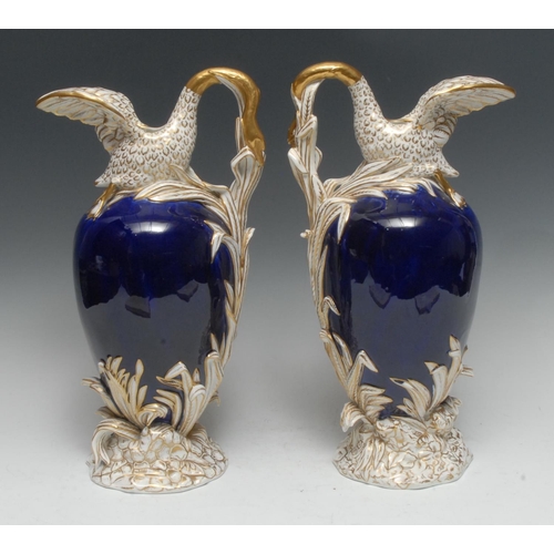 34 - A pair of early 19th century English porcelain ewers, possibly H. & R. Daniel, and of Sèvres vase cy... 
